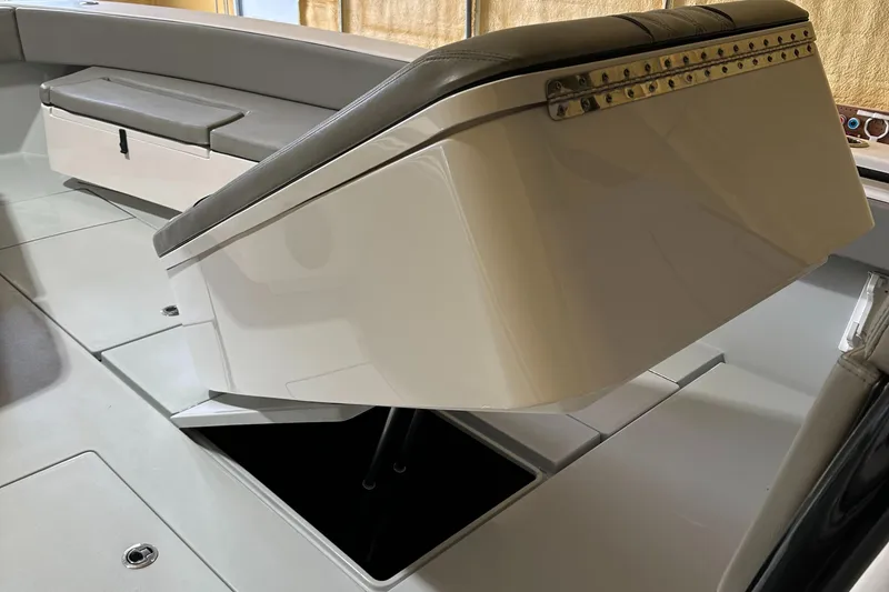 Slide: The Image of Interior of a 2018 Contender 39 ST boat with seating and storage. - 18