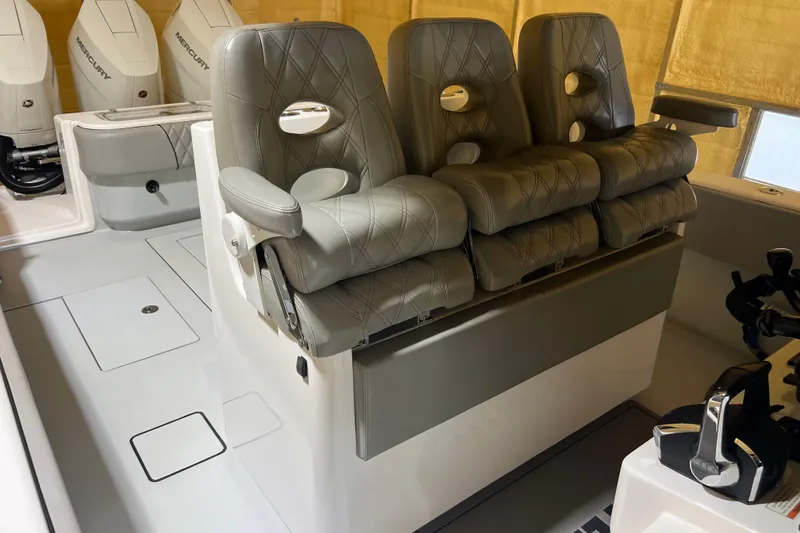 Slide: The Image of 2018 Contender 39 ST boat interior with luxurious seating and Mercury engines. - 22