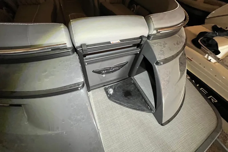 Slide: The Image of Interior view of 2024 Bennington 25 QSBWA boat, featuring sleek seating and modern design. - 55