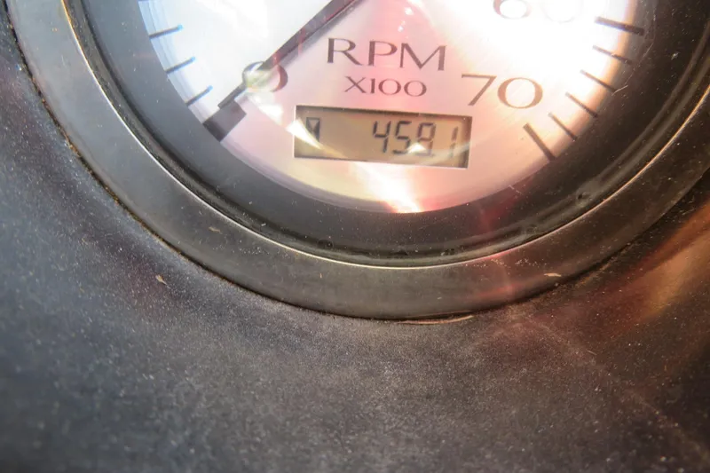 Slide: The Image of Close-up of RPM gauge on 2018 Bennington 23 SSRXP boat, showing 4591 hours. - 10
