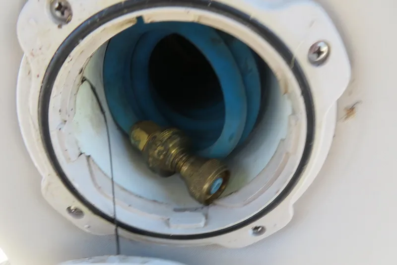 Slide: The Image of Close-up of a brass fitting inside a Bennington 23 SSRXP 2018 boat component. - 34