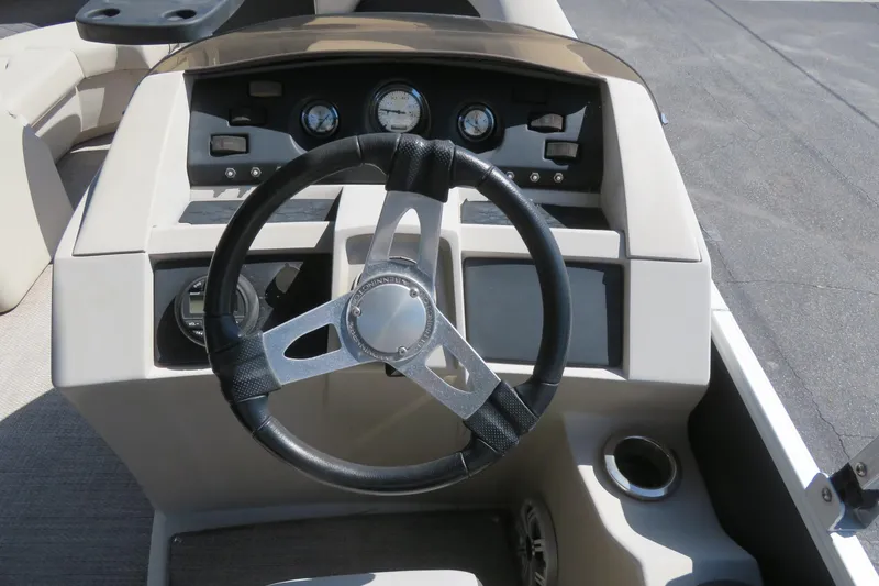 Slide: The Image of Steering console of 2018 Bennington 23 SSRXP boat with gauges and controls. - 8