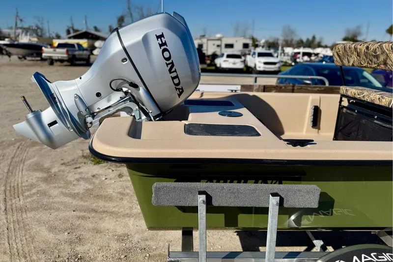 Slide: The Image of 2025 Carolina Skiff E20 JVX CC SPORTSMAN EDITION with Honda outboard motor. - 15