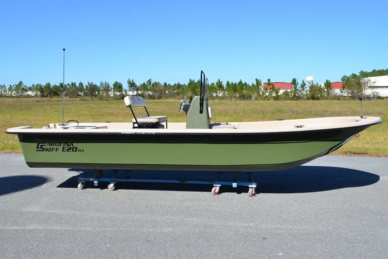 Slide: The Image of Manufacturer Provided Image: 2026 Carolina Skiff E20 JVX CC boat on display outdoors. - 22