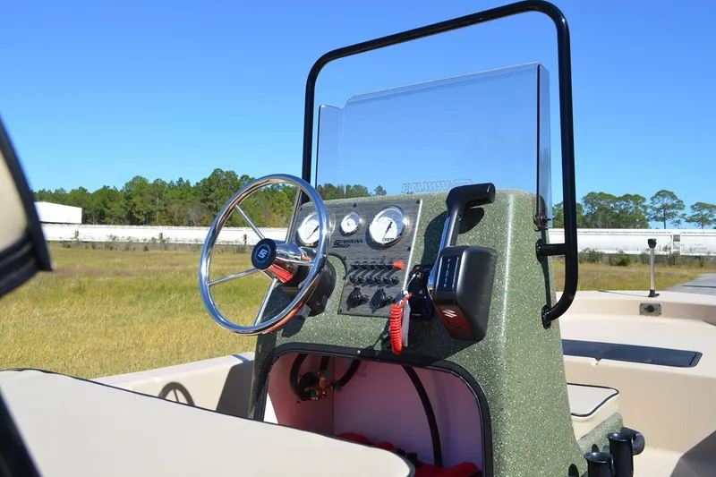 Slide: The Image of Manufacturer Provided Image: 2026 Carolina Skiff E20 JVX CC boat console with steering wheel and controls. - 25