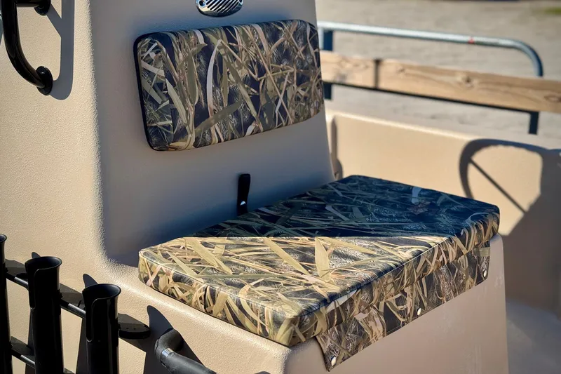 Slide: The Image of 2025 Carolina Skiff E20 JVX CC Sportsman Edition with camouflage seating detail. - 4