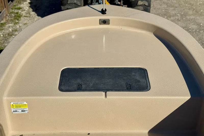 Slide: The Image of 2025 Carolina Skiff E20 JVX CC SPORTSMAN EDITION boat deck with storage compartment. - 6