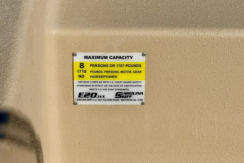 Slide: The Image of 2025 Carolina Skiff E20 JVX CC SPORTSMAN EDITION capacity label, 8 persons, 1718 pounds, 90 horsepower. - 7