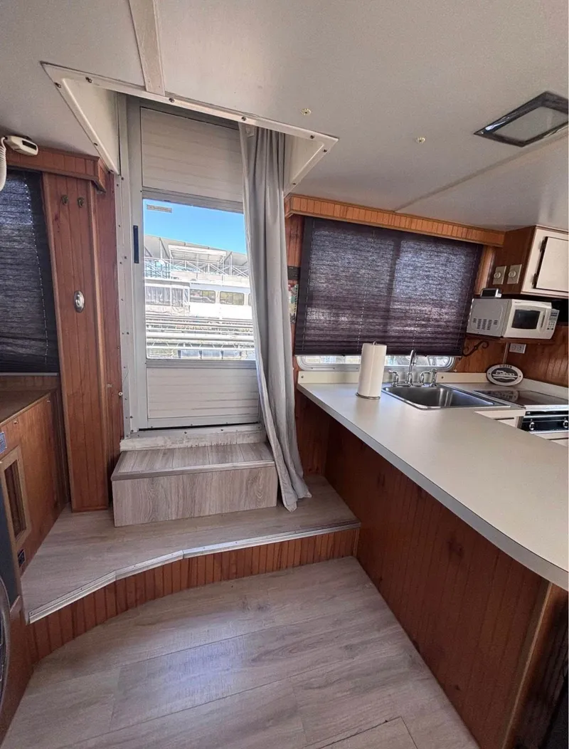 Slide: The Image of Interior of a 1992 Gibson Sport yacht with kitchen. - 5