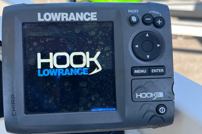 Slide: The Image of Lowrance HOOK5 fish finder on 2017 Stingray 182 SC boat dashboard. - 25
