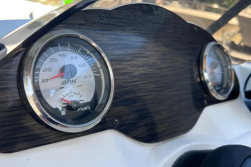 Slide: The Image of Dashboard of a 2017 Stingray 182 SC boat showing speedometer and fuel gauge. - 26