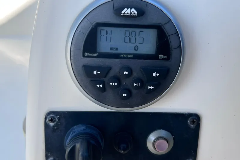 Slide: The Image of Marine audio system on a 2017 Stingray 182 SC boat dashboard. - 27