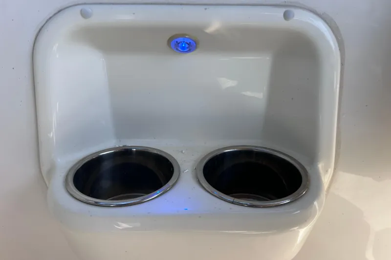 Slide: The Image of 2017 Stingray 182 SC boat cup holders with blue LED light. - 30