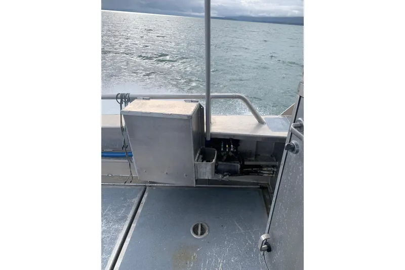 Slide: The Image of Custom 2021 Aluminum Crabber boat deck with ocean view in the background. - 20