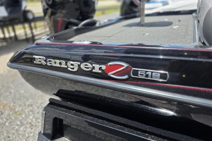 Slide: The Image of 2024 Ranger Z518 Cup-Equipped boat, close-up of logo and sleek design. - 13