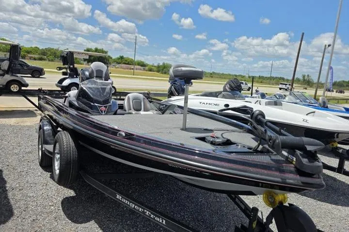 Slide: The Image of 2024 Ranger Z518 Cup-Equipped boat on trailer under a sunny sky. - 14