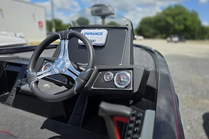 Slide: The Image of 2024 Ranger Z518 Cup-Equipped boat dashboard with steering wheel and Lowrance electronics. - 21