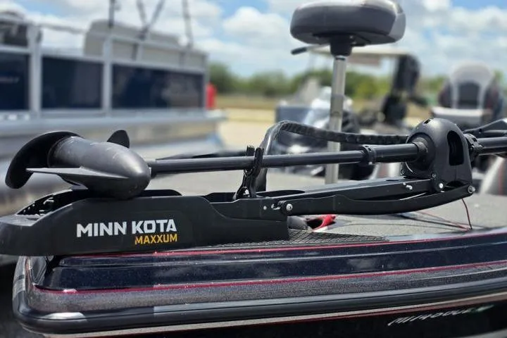 Slide: The Image of 2024 Ranger Z518 Cup-Equipped boat with Minn Kota Maxxum trolling motor on deck. - 3
