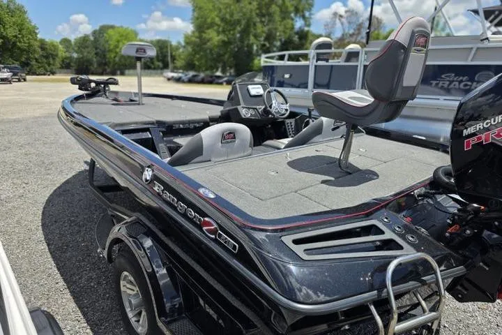 Slide: The Image of 2024 Ranger Z518 Cup-Equipped boat with Mercury Pro XS engine, parked outdoors. - 7