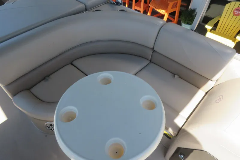 Slide: The Image of Luxurious seating area on 2015 Avalon GS 2185 RF boat with round table. - 14