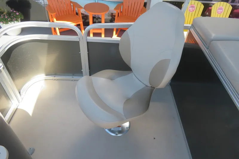 Slide: The Image of Captain's chair on 2015 Avalon GS 2185 RF pontoon boat deck. - 21