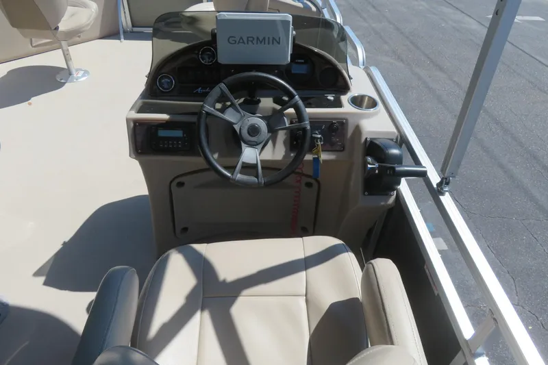 Slide: The Image of Steering console of 2015 Avalon GS 2185 RF boat with Garmin navigation system. - 25