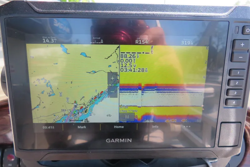 Slide: The Image of Garmin GPS display on 2015 Avalon GS 2185 RF boat, showing navigation and sonar data. - 27