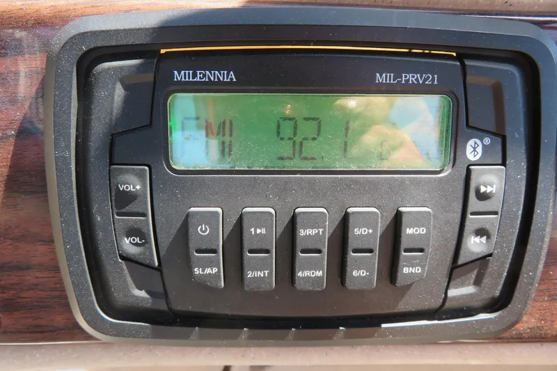 Slide: The Image of Close-up of Milennia MIL-PRV21 radio display in 2015 Avalon GS 2185 RF. - 30