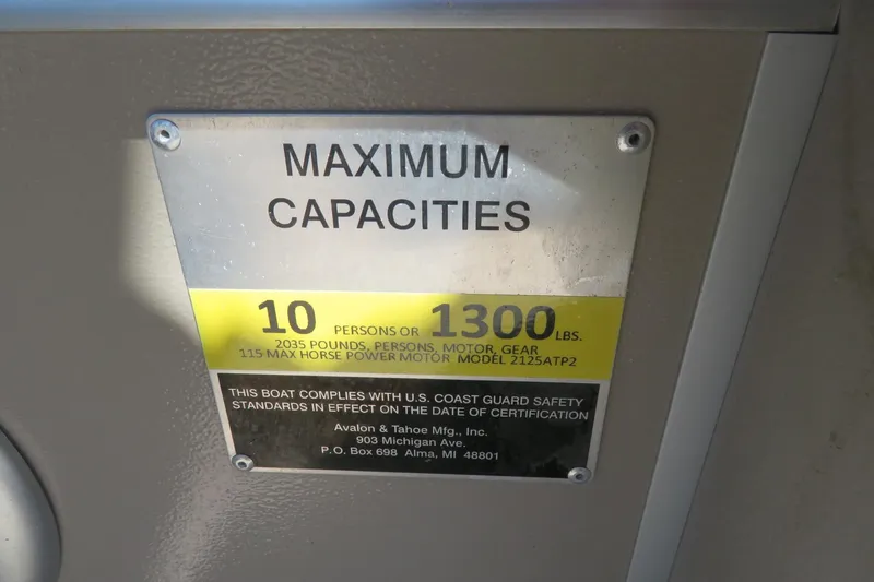 Slide: The Image of Maximum capacity sign on 2015 Avalon GS 2185 RF boat, 10 persons or 1300 lbs. - 33