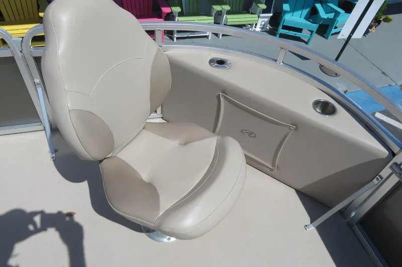 Slide: The Image of 2015 Avalon GS 2185 RF boat seat with beige upholstery and cup holders. - 9