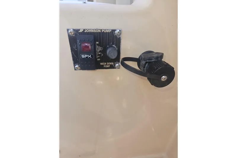 Slide: The Image of Control panel for Johnson Pump on 2014 Ranger Tugs R-27 boat. - 30