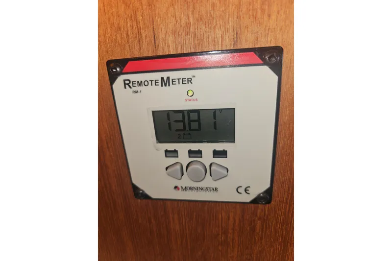 Slide: The Image of Remote meter display on 2014 Ranger Tugs R-27 boat, showing voltage reading. - 31
