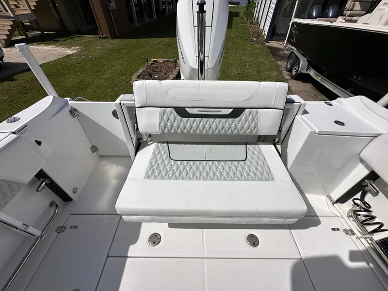Slide: The Image of Interior of 2024 Blackfin 252 DC boat with white seating. - 12