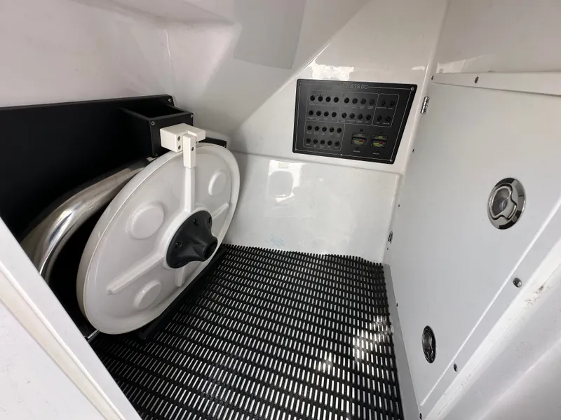 Slide: The Image of Interior of 2024 Blackfin 252 DC with control panel. - 24
