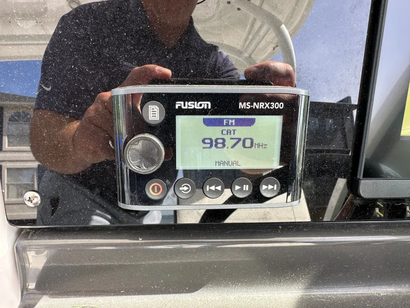 Slide: The Image of Fusion MS-NRX300 radio on Blackfin 252 DC boat, 2024 model. - 27