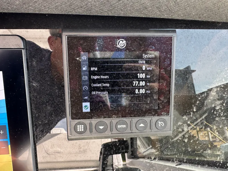 Slide: The Image of 2024 Blackfin 252 DC boat system display with engine data. - 29