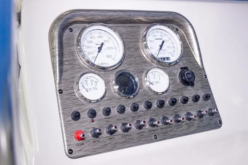 Slide: The Image of Manufacturer Provided Image: Dashboard of 2026 Carolina Skiff 23 LS with gauges and switches. - 17
