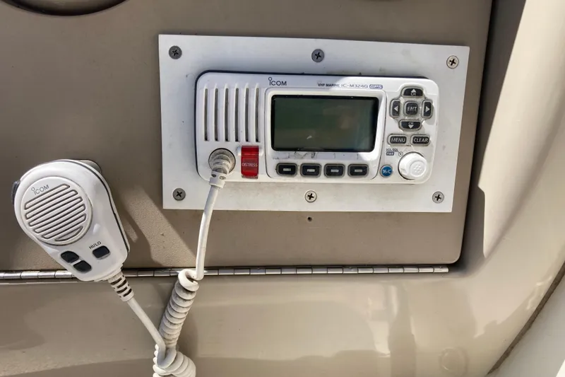 Slide: The Image of VHF marine radio on 2002 Sea Ray Sundancer 260 boat dashboard. - 15