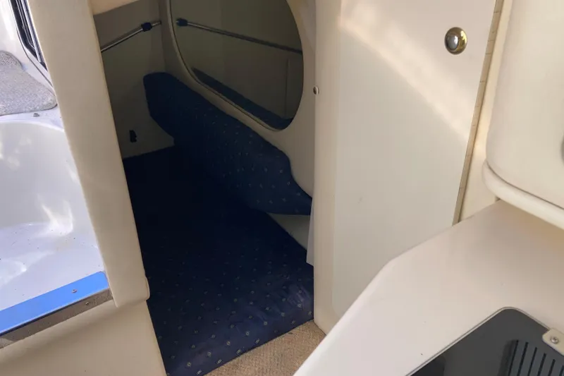 Slide: The Image of Interior cabin view of a 2002 Sea Ray Sundancer 260 boat. - 44