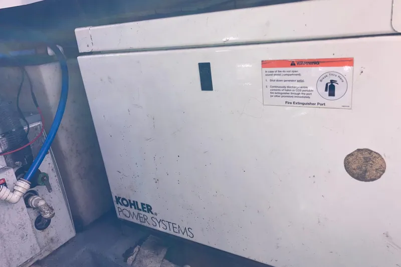 Slide: The Image of Kohler power system in 2002 Sea Ray Sundancer 260 boat engine compartment. - 49