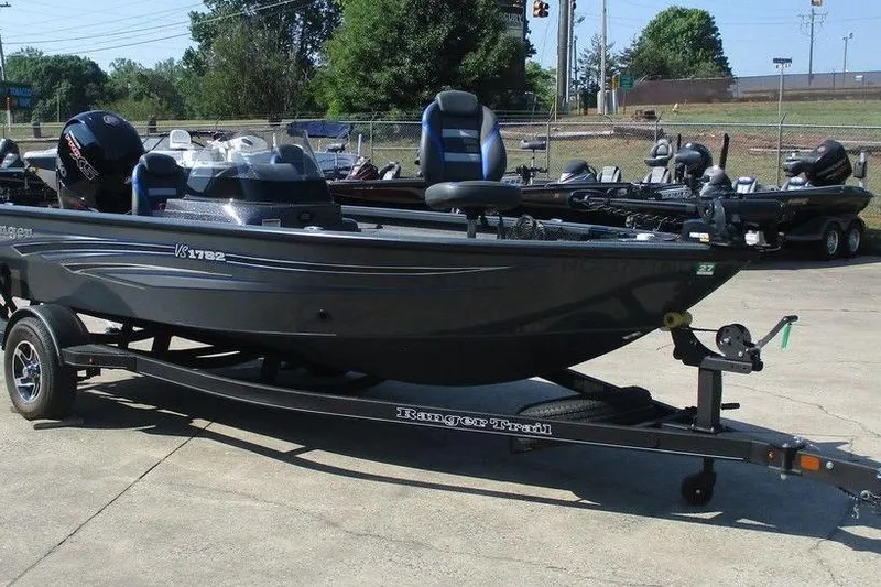 Slide: The Image of 2023 Ranger VS1782SC Angler boat on trailer, parked outdoors. - 3
