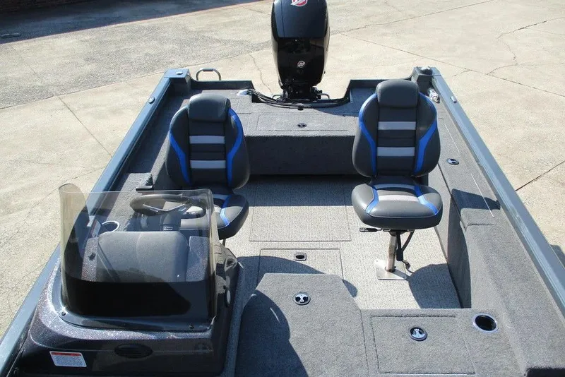 Slide: The Image of 2023 Ranger VS1782SC Angler boat interior with seating and steering console. - 4