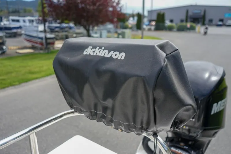 Slide: The Image of Protective cover on a 2018 C-Dory 25' Tomcat Catamaran, featuring Dickinson branding. - 22