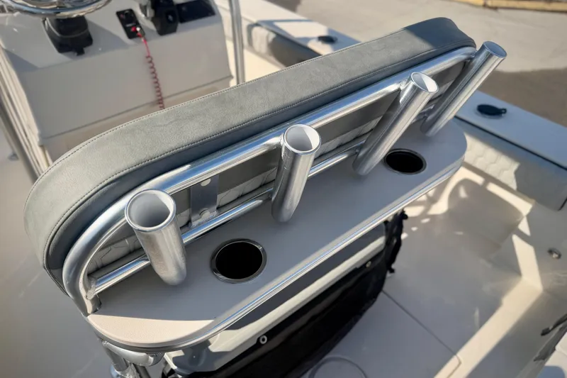 Slide: The Image of 2026 Carolina Skiff 22 Ultra Elite boat seat with rod holders and console. - 11