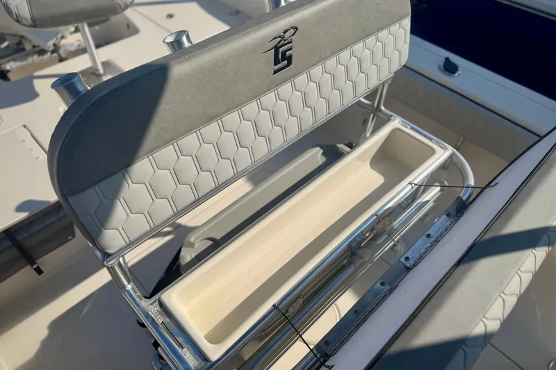 Slide: The Image of 2026 Carolina Skiff 22 Ultra Elite boat seat with storage compartment. - 13