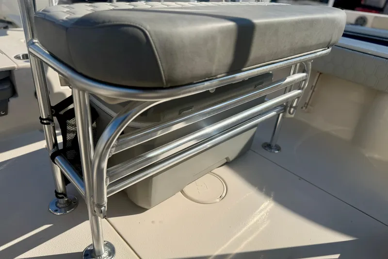 Slide: The Image of 2026 Carolina Skiff 22 Ultra Elite boat seat with storage underneath. - 16