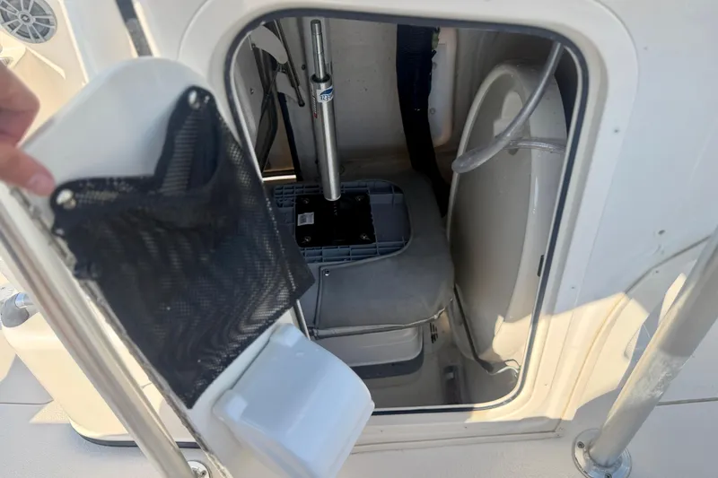 Slide: The Image of Interior storage compartment of 2026 Carolina Skiff 22 Ultra Elite boat. - 19