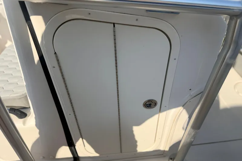 Slide: The Image of Storage compartment on a 2026 Carolina Skiff 22 Ultra Elite boat. - 20