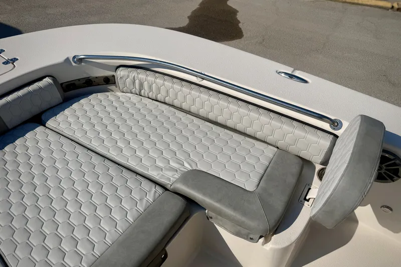 Slide: The Image of 2026 Carolina Skiff 22 Ultra Elite boat interior with cushioned seating and sleek design. - 28