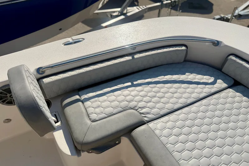 Slide: The Image of 2026 Carolina Skiff 22 Ultra Elite boat seating with hexagonal pattern upholstery. - 31
